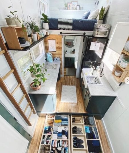 A tiny home featuring living, dining, and storage areas.